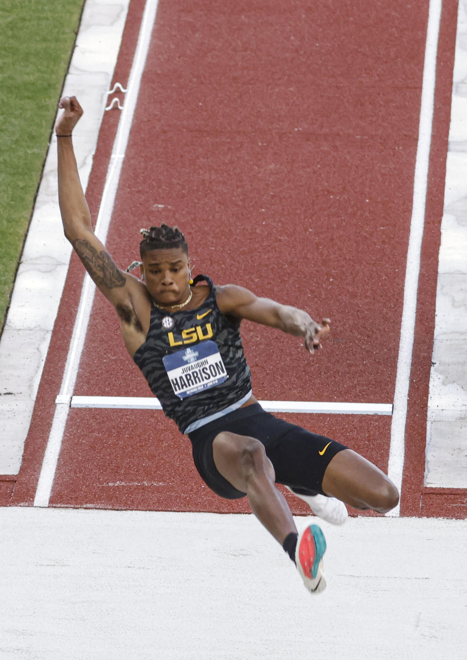 LSU's JuVaughn Harrison wins the men's long jump final during the NCAA Division I Outdoor Track and Field Championships, Wednesday, June 9, 2021, at Hayward Field in Eugene, Ore. (AP Photo/Thomas Boyd)