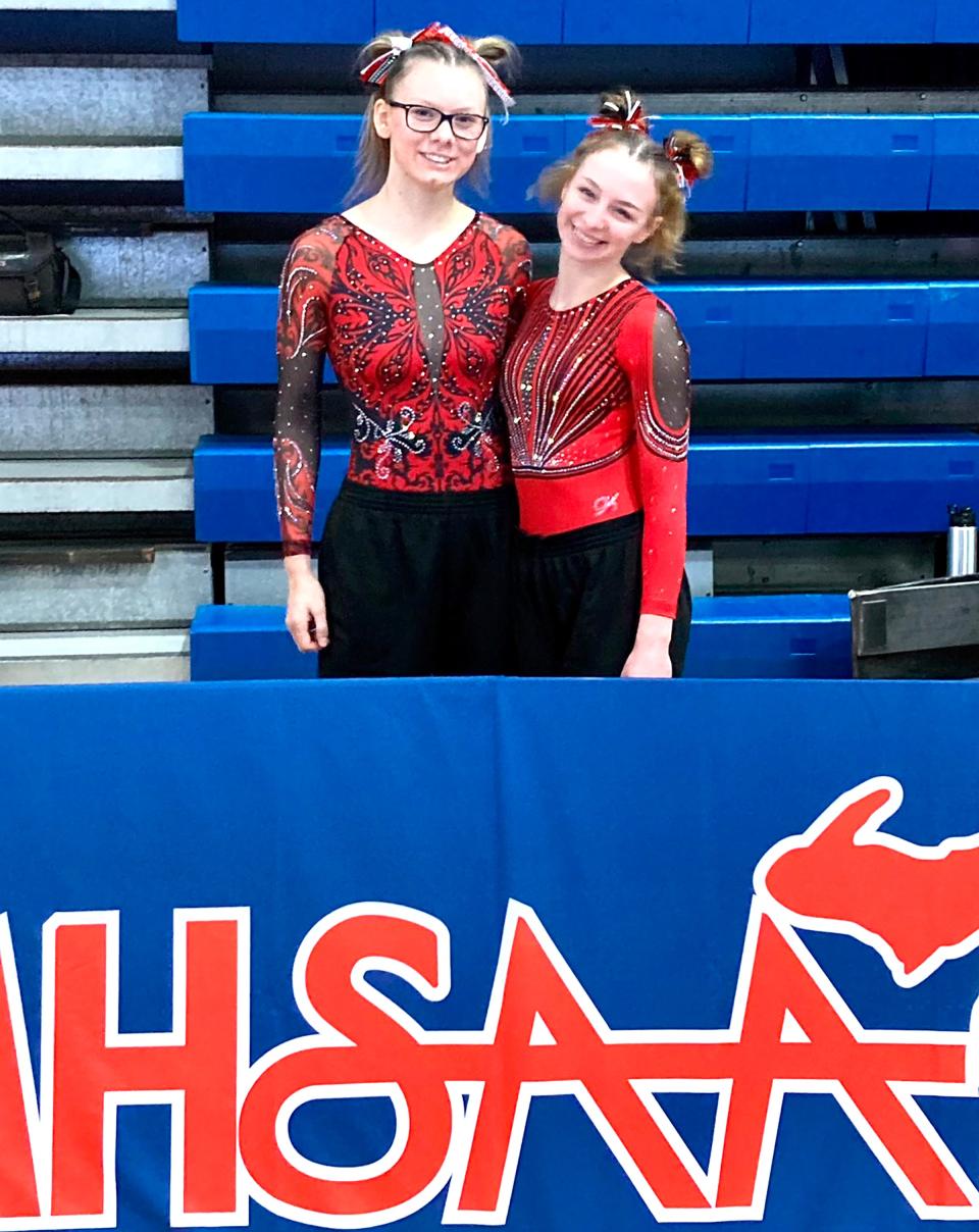 The Coldwater Cardinal gymnastics team was represented at the MHSAA State Finals by the duo of Randi Dudek (left) and Charlotte Calhoun (right).