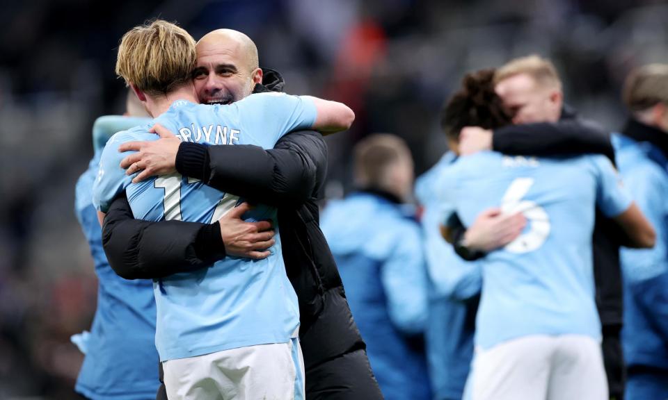 <span><a class="link " href="https://sports.yahoo.com/soccer/players/374587/" data-i13n="sec:content-canvas;subsec:anchor_text;elm:context_link" data-ylk="slk:Kevin De Bruyne;sec:content-canvas;subsec:anchor_text;elm:context_link;itc:0">Kevin De Bruyne</a> embraces Pep Guardiola after beating Newcastle. The Belgian returned from injury this season to keep <a class="link " href="https://sports.yahoo.com/soccer/teams/man-city/" data-i13n="sec:content-canvas;subsec:anchor_text;elm:context_link" data-ylk="slk:Manchester City;sec:content-canvas;subsec:anchor_text;elm:context_link;itc:0">Manchester City</a>’s title charge on track.</span><span>Photograph: Alex Livesey/Getty Images</span>