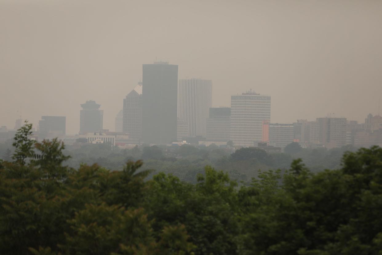 Smog from the wildfires in Canada have been making their way across the upper United States.  The smog obscures some of the Rochester skyline that is normally clearly scene at Cobb Hills Park.