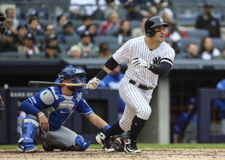 Apr 20, 2019; Bronx, NY, USA; New York Yankees center fielder Mike Tauchman (39) hits a three run home run in the fourth inning against the Kansas City Royals at Yankee Stadium. Mandatory Credit: Wendell Cruz-USA TODAY Sports