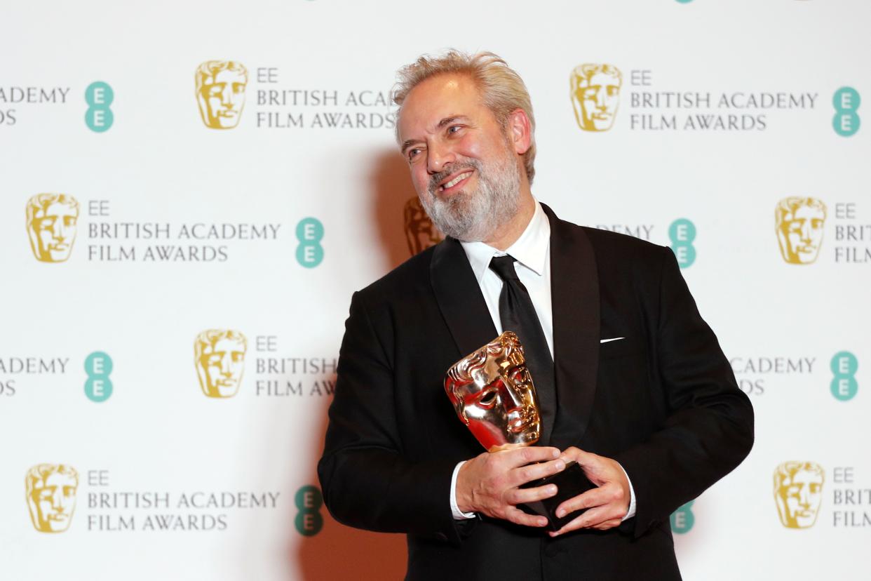 Sam Mendes poses with the award for his work on the film '1917' at the BAFTA British Academy Film Awards on February 2, 2020. (Photo by Adrian Dennis/AFP via Getty Images)
