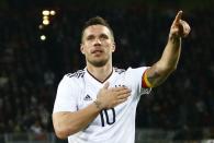 Football Soccer - Germany v England - International Friendly - Signal-Iduna-Park, Dortmund, Germany - 22/3/17 Germany's Lukas Podolski celebrates scoring their first goal Reuters / Wolfgang Rattay Livepic