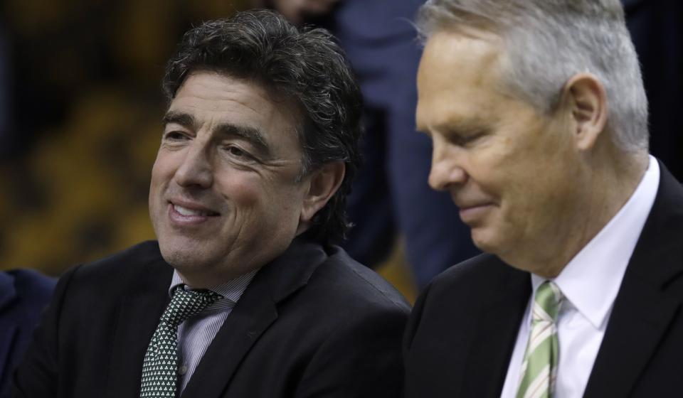 Celtics owner Wyc Grousbeck (left) and president of basketball operations Danny Ainge might have different perspectives on what to do with the No. 1 pick in the draft. (AP)