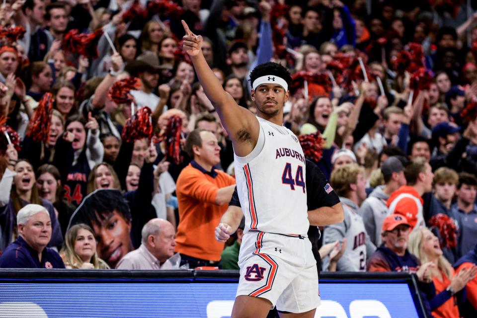 Auburn center Dylan Cardwell (44) reacts after a Georgia turnover during the second half of an NCAA college basketball game Wednesday, Jan. 19, 2022, in Auburn, Ala. (AP Photo/Butch Dill)