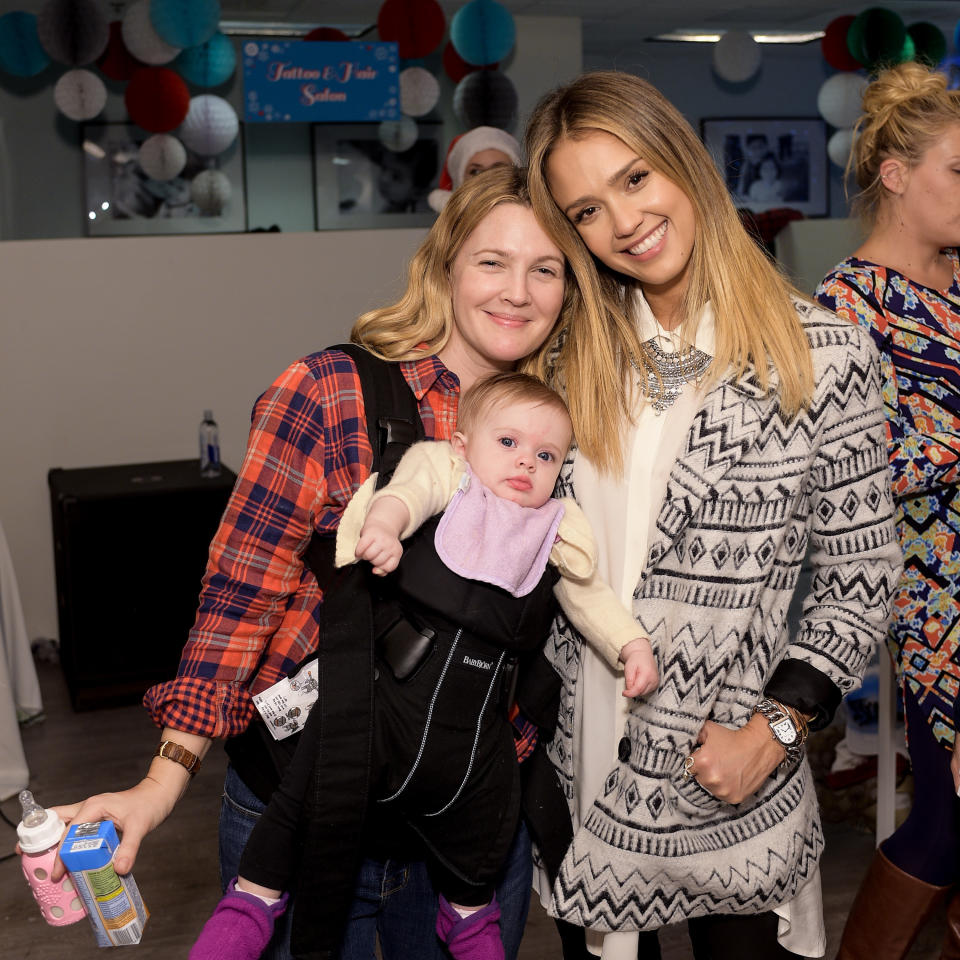 <p>The two actresses may not have been friends in their film "Never Been Kissed," but the ladies were all smiles when <a href="http://www.usmagazine.com/celebrity-moms/news/drew-barrymore-jessica-alba-kids-charity-event-pictures-20141412">they hung out at the Baby2Baby holiday party in 2014</a>.&nbsp;</p>