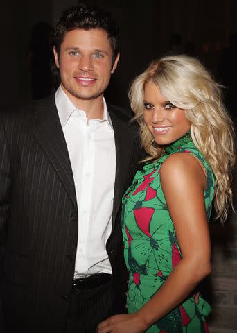 <p>Mark Mainz/Getty Images</p> Nick Lachey and Jessica Simpson attend the Gucci Spring 2006 fashion show in Beverly Hills.