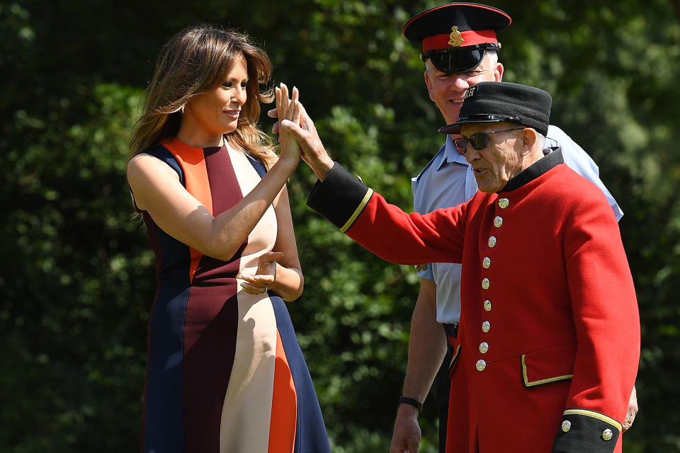 Melania Trump, pictured high-fiving a Chelsea Pensioner. [Photo: Getty]