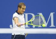 Sep 9, 2015; New York, NY, USA; Richard Gasquet of France returns a shot to Roger Federer of Switzerland on day ten of the 2015 U.S. Open tennis tournament at USTA Billie Jean King National Tennis Center. Mandatory Credit: Jerry Lai-USA TODAY Sports