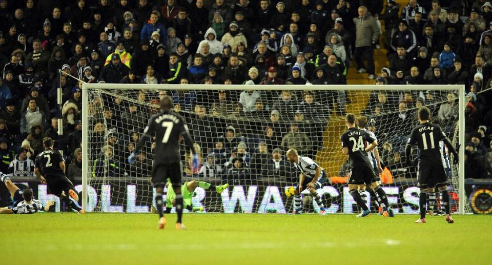 Chelsea's Branislav Ivanovic, far left, scores against West Brom during the English Premier League soccer match between West Bromwich Albion and Chelsea at The Hawthorns Stadium in West Bromwich, England, Tuesday, Feb. 11, 2014. (AP Photo/Rui Vieira)