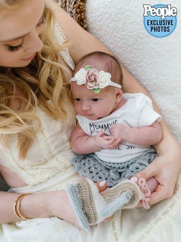 <p>Jenny Quicksall Photography</p> Tara Lipinski and baby Georgie