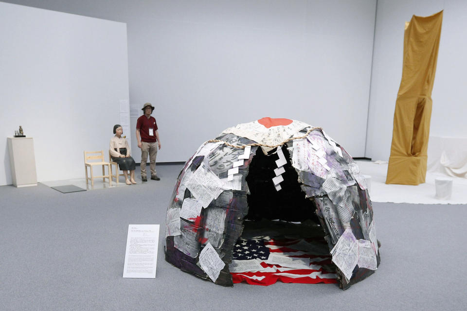 This Aug. 3, 2019, photo, shows artworks for an exhibition in Nagoya, central Japan. The exhibit, part of Aichi Triennale 2019 art festival, resumed after it was forced to close down following threat over a statue of wartime Korean women sexually abused by Japanese soldiers. (Kyodo News via AP)