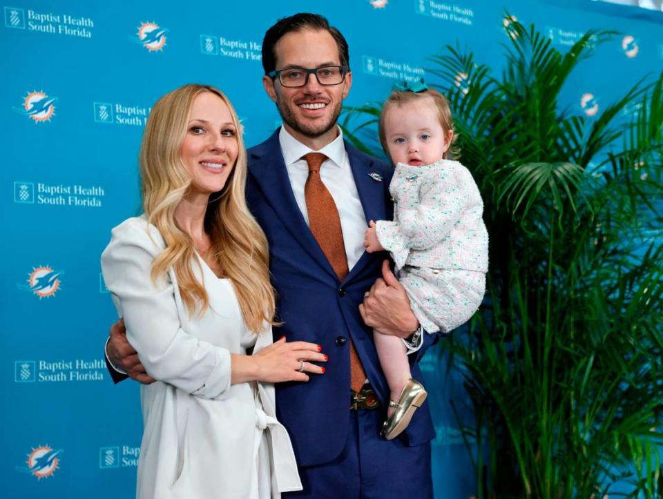 New Miami Dolphins head coach Mike McDaniel poses for the pictures alongside his wife Katie and daughter Ayla June after his introductory press conference at Baptist Health Training Complex in Hard Rock Stadium on Thursday, February 10, 2022 in Miami Gardens, Florida.