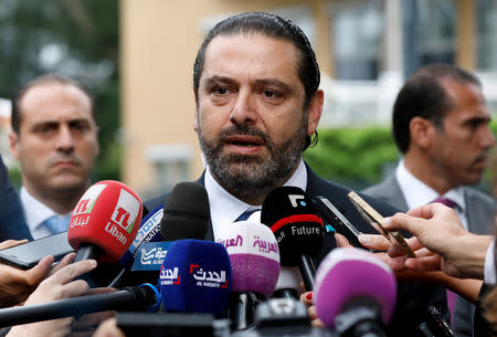 FILE PHOTO: Lebanese Prime Minister-designate Saad al-Hariri speaks to the media in front of the Special Tribunal for Lebanon ahead of the closings arguments in the trial of Lebanon's Rafik al-Hariri alleged killers in the Hague, the Netherlands September 11, 2018. Bas Czerwinski/Pool via REUTERS/File Photo