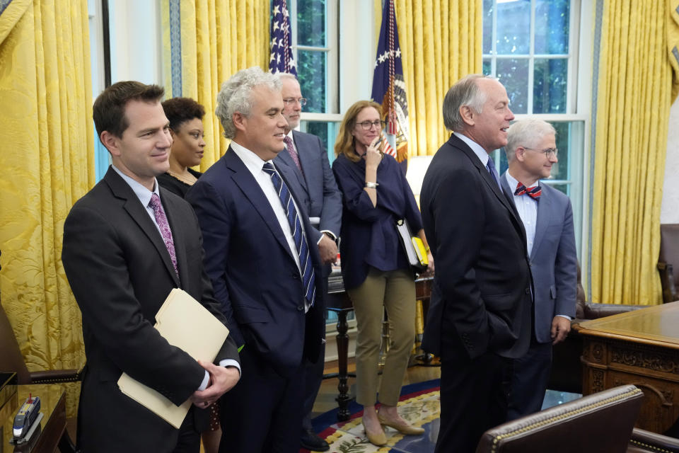 From left, Brittan Specht, Kevin McCarthy's chief of staff's senior policy advisor, Shalanda Young, director of the Office of Management and Budget, White House chief of staff Jeff Zients, Dan Meyer, House Speaker Kevin McCarthy's chief of staff, Louisa Terrell, legislative affairs director, Steve Ricchetti, counselor to the president, and Rep. Patrick McHenry, R-N.C., listen as President Joe Biden meets with House Speaker Kevin McCarthy of Calif., to discuss the debt limit in the Oval Office of the White House, Monday, May 22, 2023, in Washington. (AP Photo/Alex Brandon)