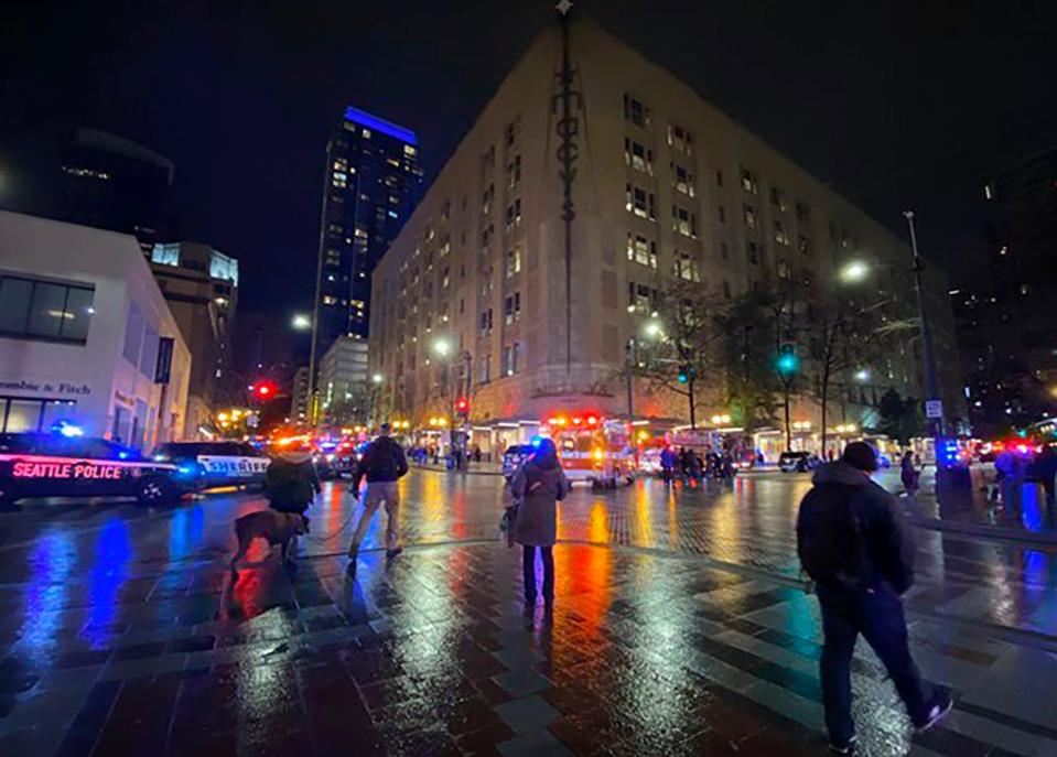 A gunman opened fire in downtown Seattle on Wednesday night, killing at least one person and injuring seven others, authorities said.