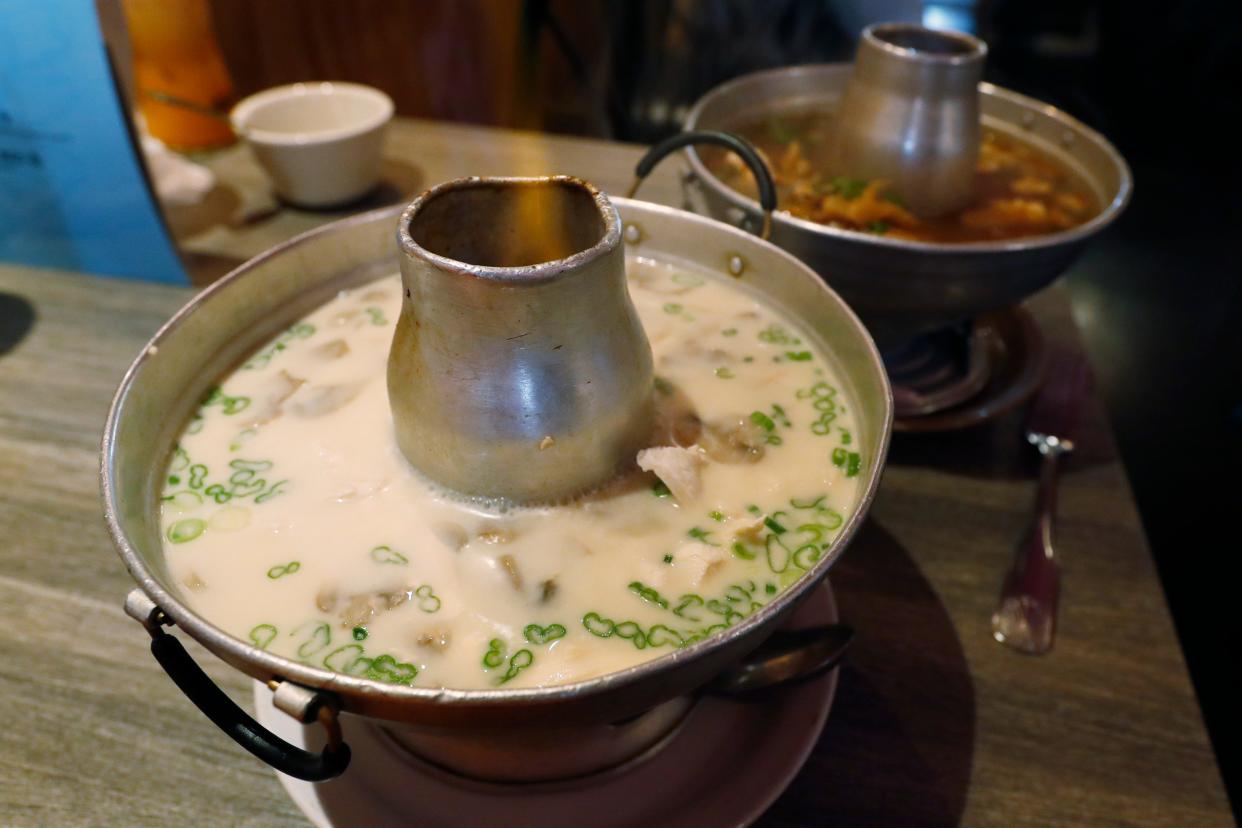 The coconut and tom yum soups served in a flaming bowl at Thai Spoon in downtown Athens, Ga., on Thursday, Jan. 25, 2024.