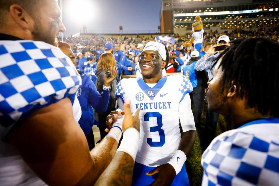 Kentucky quarterback Terry Wilson (3) celebrated with tight end C.J. Conrad after their game-winning touchdown connection against Missouri in 2018. Alex Slitz/Herald-Leader file photo