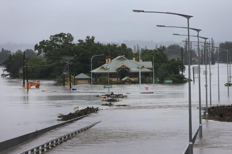 <div class="inline-image__caption"><p>The Windsor Bridge is submerged under rising floodwaters along the Hawkesbury River on March 22, 2021 in Sydney, Australia. </p></div> <div class="inline-image__credit">Lisa Maree Williams/Getty </div>