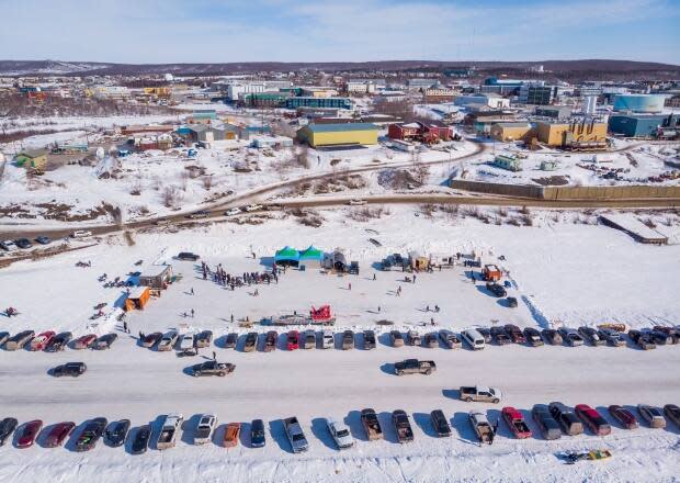 Vehicles parked on river ice for the 2019 Muskrat Jamboree in Inuvik. There will be no food vendors this year to make more room for participants in events.