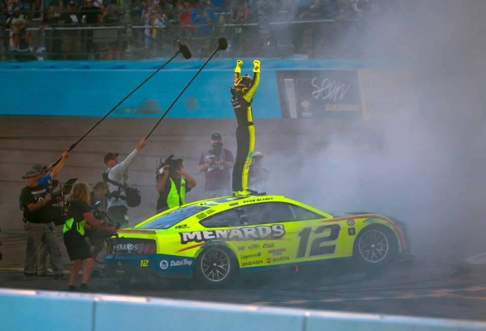 Nov 5, 2023; Avondale, Arizona, USA; NASCAR Cup Series driver Ryan Blaney celebrates after winning the 2023 NASCAR Cup Series championship at Phoenix Raceway.