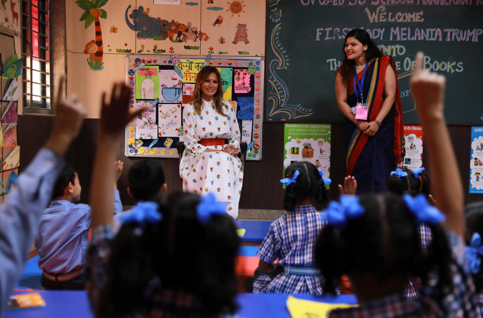 U.S. first lady Melania Trump talks with children at a school in New Delhi, during a visit of U.S. President Donald Trump in India, February 25, 2020. REUTERS/Anushree Fadnavis