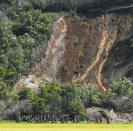 <p>Japan Ground Self-Defense Force personnel head to the site of a landslide following a strong earthquake in Atsuma town, Hokkaido, northern Japan, Thursday, Sept. 6, 2018. (Photo: Yu Nakajima/Kyodo News via AP) </p>