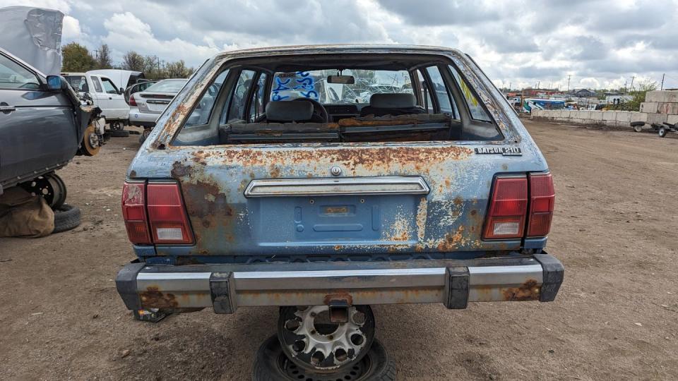 1980 datsun 210 wagon with 400k miles in colorado junkyard