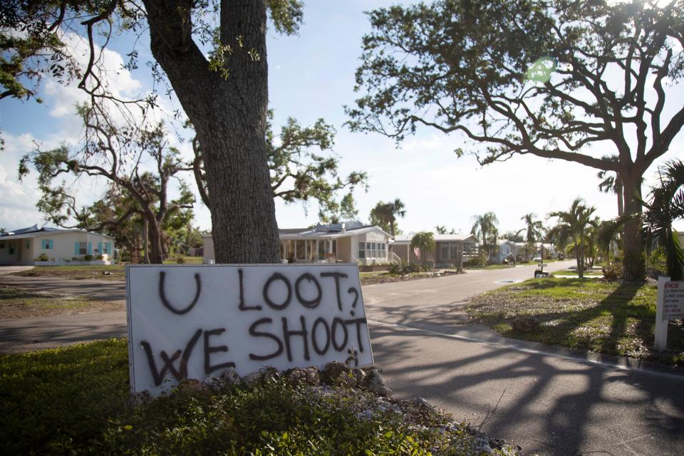 A handmade sign greets visitors to Century 21 mobile home park on Wednesday, November 2, 2022, in south Fort Myers. The park was flooded by Hurricane Ian, but several residents are still living in their homes.