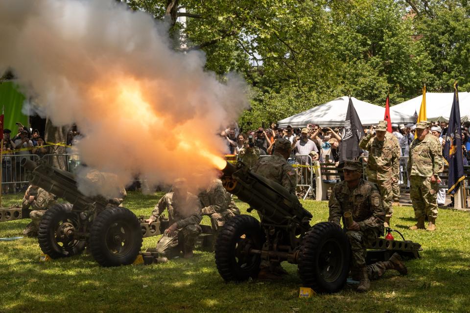 Members of the Veteran Service Organization fire a 21-gun salute during the 156th Brooklyn's Memorial Day Parade in New York City on Monday.