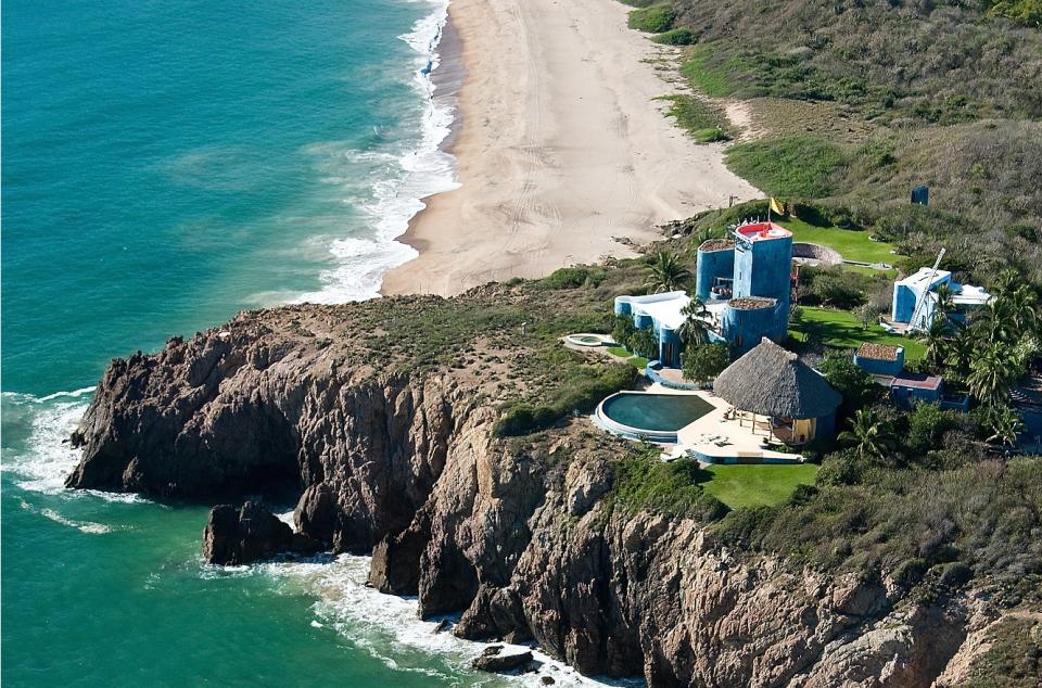 The Ocean Castle Tigre Del Mar cuts an almost surreal profile against the landscape.