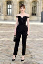 <p>The “50 Shades of Grey” actress, Dakota Johnson, attended the Dior show during Paris Fashion Week, wearing none other than Dior. Does this count as a suit? Kind of. The skinny trousers certainly do but the top is like a club version of a tuxedo top.</p>