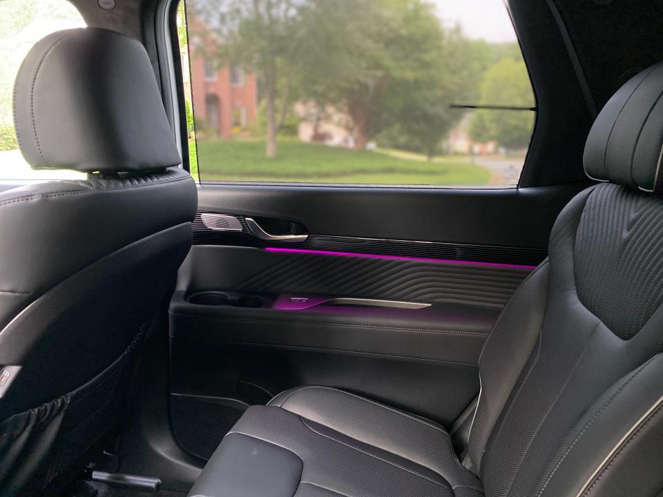 A second-row captain's chair in a Hyundai Palisade SUV.