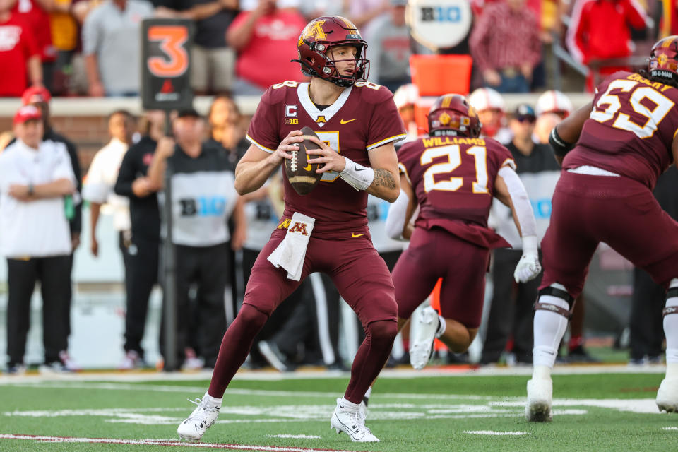 Aug 31, 2023; Minneapolis, Minnesota, USA; Minnesota Golden Gophers quarterback Athan Kaliakmanis (8) looks to pass against the Nebraska Cornhuskers during the first quarter at Huntington Bank Stadium. Mandatory Credit: Matt Krohn-USA TODAY Sports