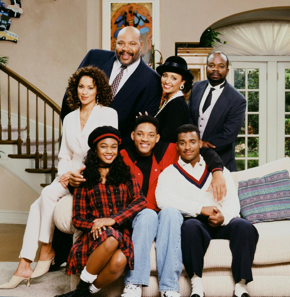 The cast of "The Fresh Prince of Bel-Air," featuring Karyn Parsons as Hilary Banks, James Avery as Philip Banks, Daphne Reid as Vivian Banks, Joseph Marcell as Geoffrey; Front: Tatyana Ali as Ashley Banks, Will Smith as William 'Will' Smith, Alfonso Ribeiro as Carlton Banks