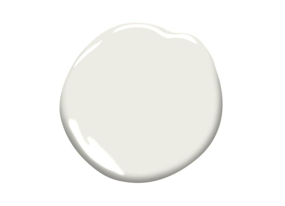 Benjamin Moore’s <a rel="nofollow noopener" href="https://www.architecturaldigest.com/story/white-dove-paint-color?mbid=synd_yahoo_rss" target="_blank" data-ylk="slk:White Dove;elm:context_link;itc:0;sec:content-canvas" class="link ">White Dove</a> (OC-17) is a versatile neutral shade that counts designers Madeline Stuart and Nestor Santa Cruz as fans. “White Dove has been an extremely popular white, as it is especially neutral and it complements a wide range of colors,” <a rel="nofollow noopener" href="https://www.benjaminmoore.com" target="_blank" data-ylk="slk:Benjamin Moore;elm:context_link;itc:0;sec:content-canvas" class="link ">Benjamin Moore</a> color and design expert Andrea Magno told <em>AD</em>. The shade is a go-to for walls, trim, cabinetry, and other millwork, and it consistently ranks as a top-selling paint for the company. The shade has a touch of gray that keep it from feeling stark. “White Dove also maintains enough warmth so that it is not too cool, yet it does not go too creamy or yellow,” Magno said.