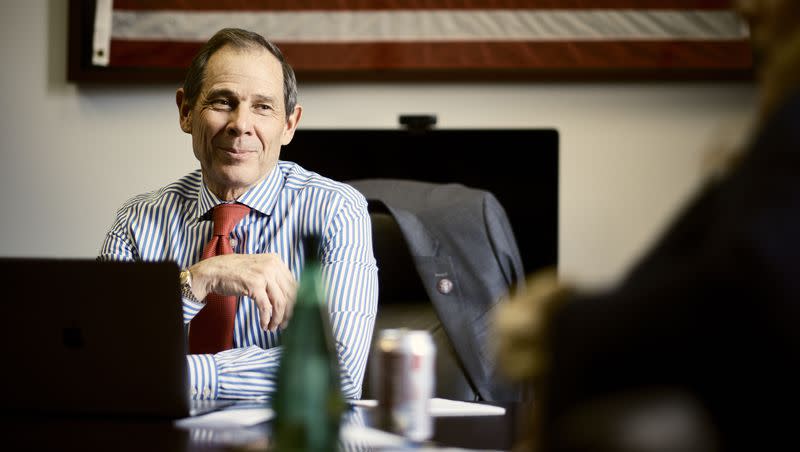 U.S. Rep. John Curtis, R-Utah, sits in a meeting with the executive director and assistant director of the Conservative Climate Caucus on Capitol Hill in Washington, D.C., on Tuesday, March 28, 2023.