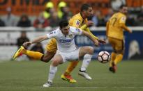 Britain Football Soccer - Sutton United v Leeds United - FA Cup Fourth Round - The Borough Sports Ground - 29/1/17 Leeds' Lewie Coyle in action with Sutton United's Craig Eastmond Action Images via Reuters / Andrew Couldridge Livepic EDITORIAL USE ONLY. No use with unauthorized audio, video, data, fixture lists, club/league logos or "live" services. Online in-match use limited to 45 images, no video emulation. No use in betting, games or single club/league/player publications. Please contact your account representative for further details.