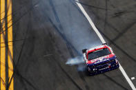 DAYTONA BEACH, FL - FEBRUARY 25: Jason Bowles drives the #81 PledgeToVote.com Dodge back to the pits after being involved in an on track incident during the NASCAR Nationwide Series DRIVE4COPD 300 at Daytona International Speedway on February 25, 2012 in Daytona Beach, Florida. (Photo by Tom Pennington/Getty Images for NASCAR)