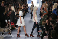 Models wear creations for Louis Vuitton's ready to wear fall/winter 2014-2015 fashion collection presented in Paris, Wednesday, March 5, 2014. (AP Photo/Jacques Brinon)