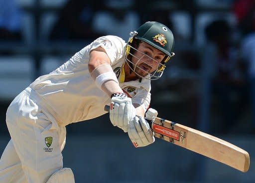 Australian batsman Ed Cowan plays a shot during the third day of the third Test match against the West Indies in April. Cowan goes into the first Test under pressure to hold on to his Test spot with top-order batsman Rob Quiney to make his Test debut for injured allrounder Shane Watson