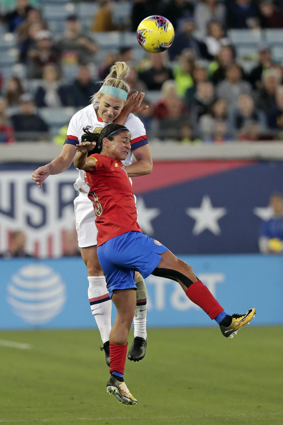 United States midfielder Julie Ertz goes up for a header over Costa Rica midfielder Shirley Curz during the first half of an international friendly soccer match Sunday, Nov. 10, 2019, in Jacksonville, Fla. (AP Photo/John Raoux)