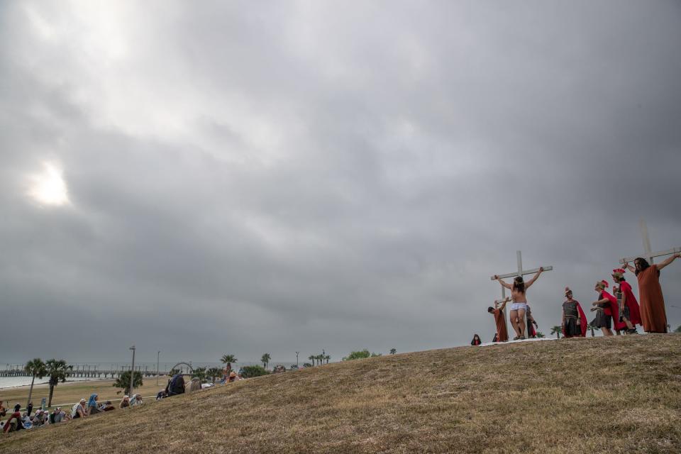 Jesus Christ, played by Rich Lockhart, is crucified at Cole Park during the Easter Sunday Sunrise Passion Play, April 17, 2022.