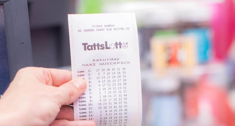 A TattLotto ticket being bought at a news agency. Source: The Lott
