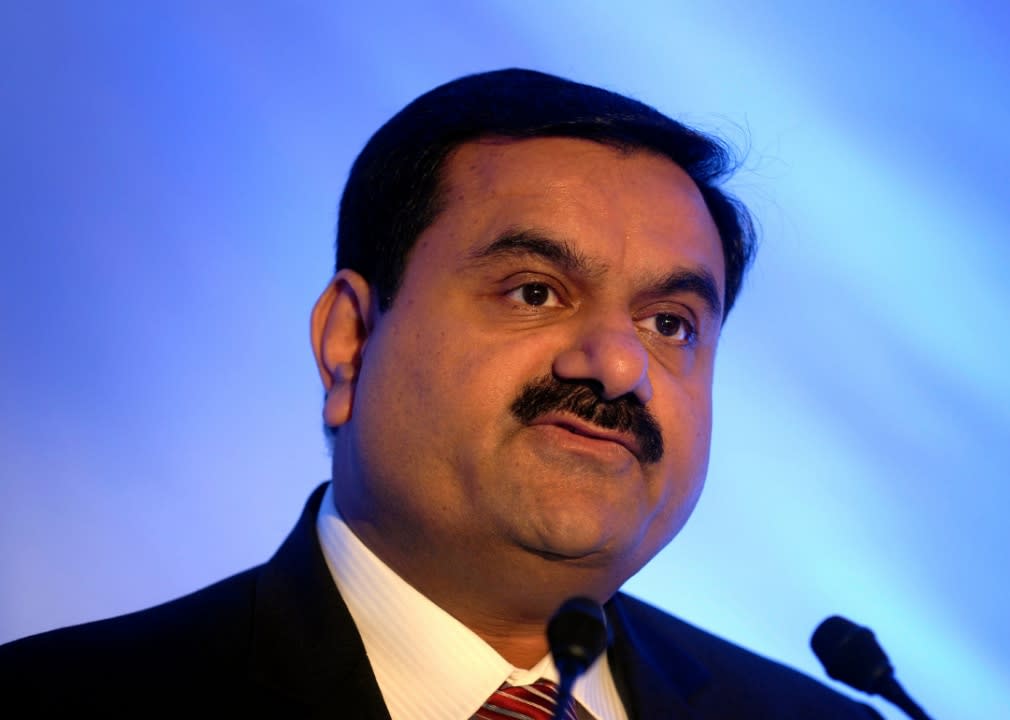 21. Gautam Adani & family | Net worth: $53.8 billion - Source of wealth: infrastructure, commodities - Age: 58 - Country/territory: India | India’s Gautam Shantilal Adani is founder and chairman of the multinational conglomerate Adani Group, which was established in 1988. Adani Group, India’s largest port developer and operator, also has major holdings in energy, resources, agriculture, aerospace, and defense. Adani is also president of the Adani Foundation, which is chaired by his wife, Priti Adani. (Getty Images)