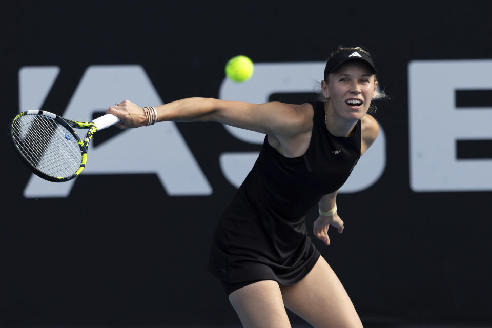 Caroline Wozniacki of Denmark plays against Elina Svitolina of Ukraine during her singles match at the ASB Classic tennis tournament in Auckland, New Zealand, Tuesday, Jan. 2, 2024. (Brett Phibbs/Photosport via AP)