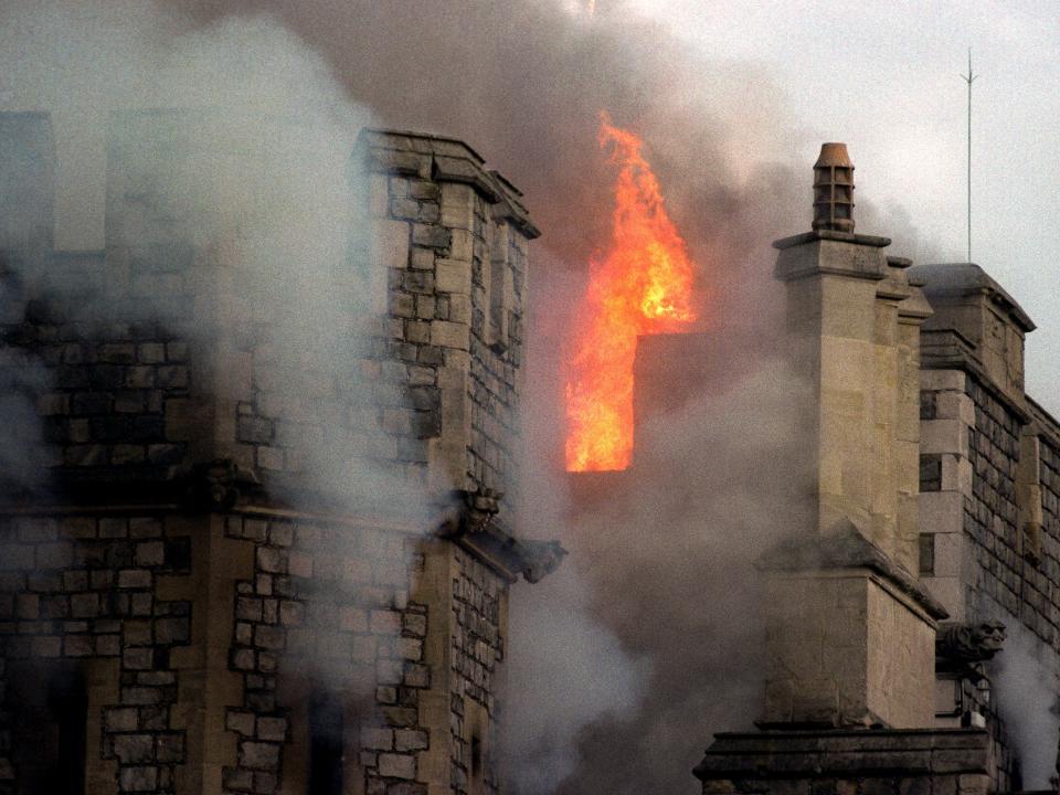 Flames leap through the roof of Windsor Castle as fire sweeps through the Royal residence.
