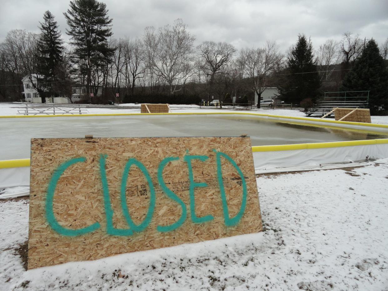 "CLOSED" signs have temporarily been in place at the Hawley ice skating rink in Bingham Park awaiting return of cold enough weather to let the ice form sufficiently. Open water could be seen at one end of the rink, as seen here on January 24. This is the firts time in several years that Hawley has offered ice skating. The 00rink was purchased by  Hawley Parks & Recreation Commission.