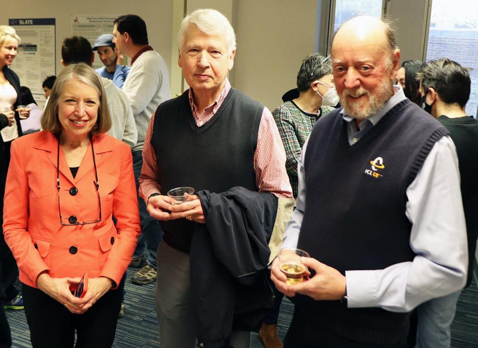 Sue, Jack Dongarra's wife, from left, and former associate director of the Innovative computing Laboratory Terry Moore join Jack at the University of Tennessee celebration of his award.