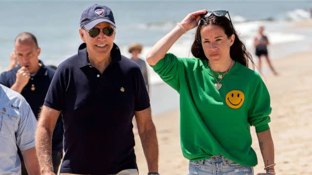 PHOTO: President Joe Biden walks on the beach with daughter Ashley Biden, in Rehoboth Beach, Del., June 20, 2022.  (Manuel Balce Ceneta/AP, FILE)